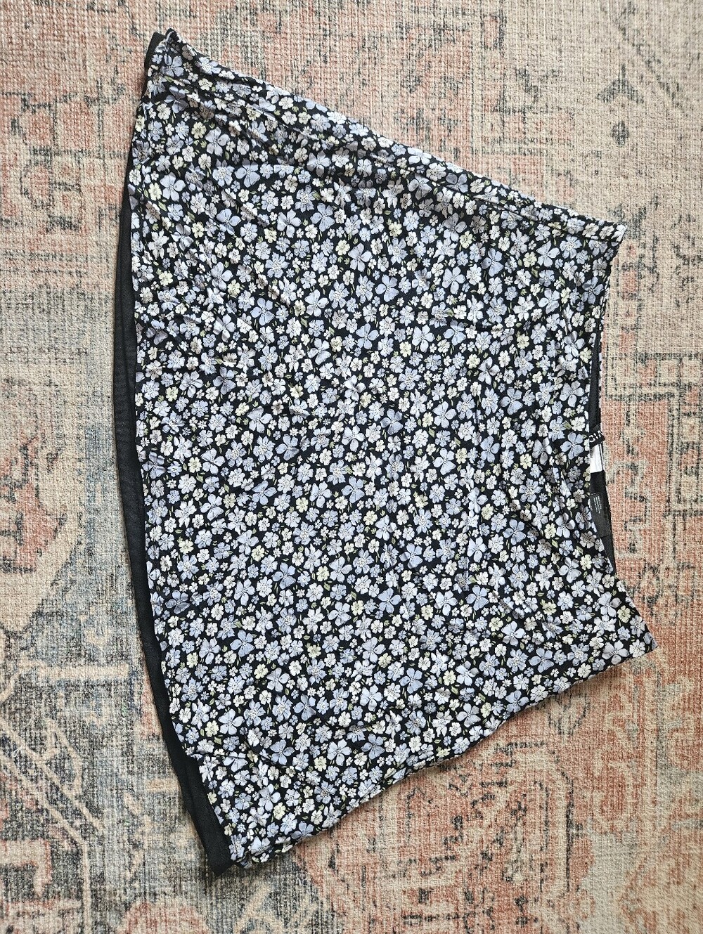 H&M Black Mini Skirt with Light Blue and White Floral Print